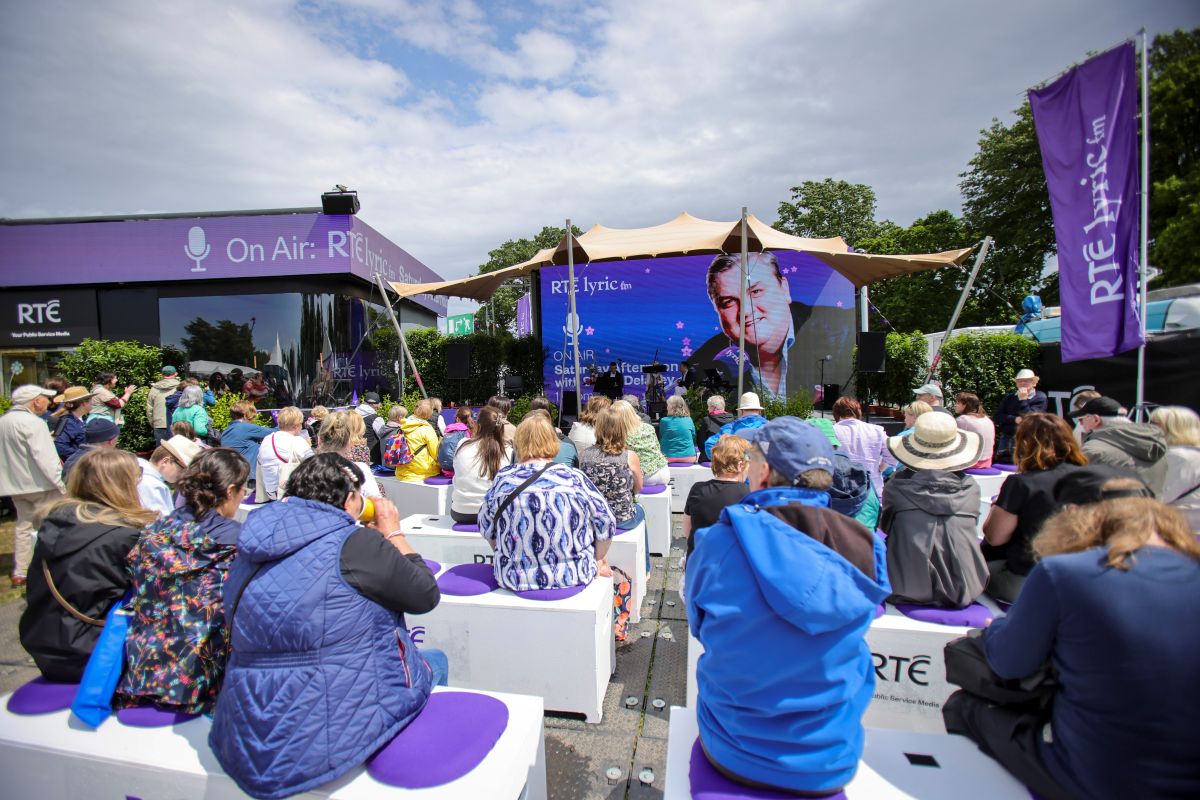 Crowd sitting and listening at RTÉ lyric stand